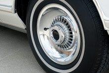 Close Up Of Reto Wheel And White Wall Tire On Classic Luxury Car