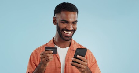 Poster - man, credit card and excited with phone, studio and thinking of sale, promo code or info by blue bac