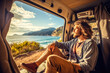 © MVProductions - Handsome young man enjoying outside retro caravan with sunrise in the background, traveling lifestyle