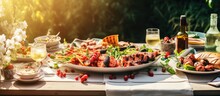 A Variety Of Appetizers Served For An Outdoor Summer Picnic At Home Including Grilled Vegetables Lemonade Steak And Camembert Cheese