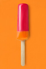 Wall Mural - Popsicle on yellow background