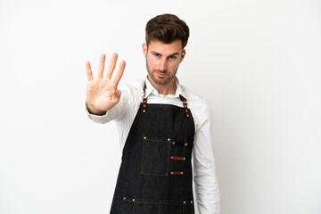 Wall Mural - Restaurant caucasian waiter isolated on white background happy and counting four with fingers