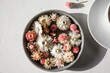 © Westend61 - Studio shot of bowl of dried flower heads
