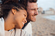 © Westend61 - Happy couple spending leisure time at beach