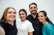 © Westend61 - Smiling dentists in front of wall at clinic