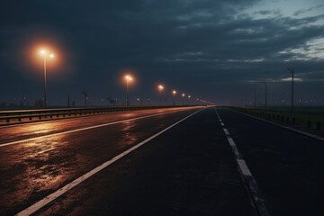 Poster - A picture of an empty highway at night with street lights. Perfect for illustrating concepts of solitude, urban life, or the open road.