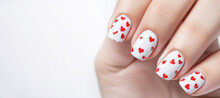 Banner Valentines Day Nail Art, Female Hands With Beautiful Fashion Glamour Manicure In Red Colors With Hearts Design On Nails On White Background.