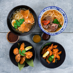 Poster - Set of soup with noodles, chicken and beef, fried breaded chicken fillet and sauces.