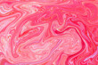 fondo con textura de color rojo y rosa de pintura liquida
