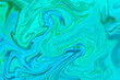 fondo con textura de olas de pintura liquida azul y verde