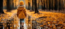 Child Girl Walks In The Autumn Park In A Raincoat Generative AI