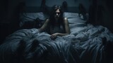 Fototapeta Zwierzęta - Woman suffering from nightmares lying in her bed