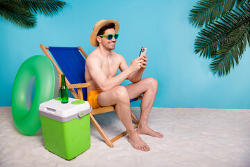 Sticker - Full length photo of positive funky shirtless man straw hat chatting instagram twitter telegram facebook isolated blue color background