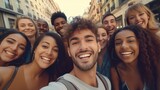 Fototapeta  - A group of young people capturing a fun moment with a selfie