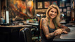 Young woman tattoo artist in a tattoo shop