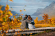 A middle aged couple watching over Ersfjord, Autumn in Tromso and it's neighbouring island Kvaloya