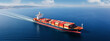 Aerial drone panoramic ultra wide photo with copy space of industrial truck size container tanker ship cruising in open ocean deep blue sea