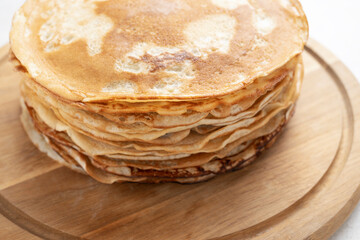 Wall Mural - Homemade Crepes pancakes on a plate, top view