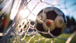 football or soccer ball in goal net