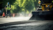 Asphalt paving with special equipment. Replacement and repair of roadbed on city streets. Repair of roads, asphalt roller. 