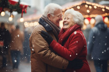 Beautiful senior couple dancing together on traditional Christmas market on winter evening. Elderly woman and man enjoying themselves in Christmas town decorated with lights.