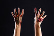 Zombie hands on black background. Halloween celebration