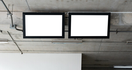 Canvas Print - tv flat screen lcd with white blank monitor mockup hanging on the wall.