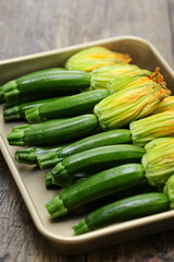 Wall Mural - zucchini flowers in a tray