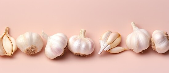 Aufkleber - Raw garlic cloves isolated on a isolated pastel background Copy space with clipping path