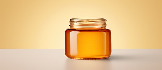 Poster - copy space image on isolated background with glass jar filled with honey