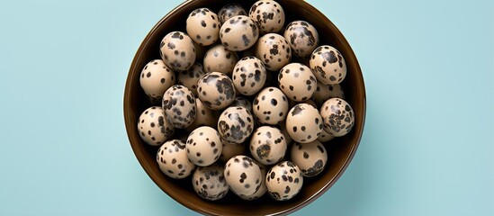 Aufkleber - Protein rich and healthy quail eggs on isolated black tray isolated pastel background Copy space
