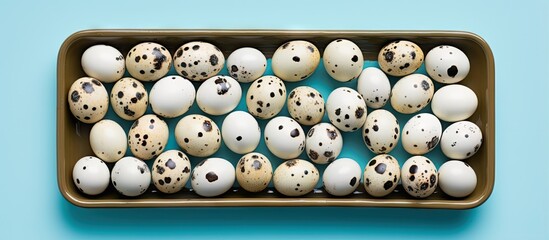 Aufkleber - Protein rich and healthy quail eggs on isolated black tray isolated pastel background Copy space