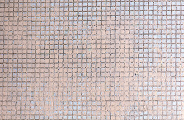 Sticker - Small tiles on the wall as an abstract background. Texture