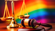 Judge's gavel against the background of a rainbow flag and scales of justice