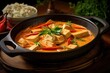 panang curry with tofu in a deep ceramic dish