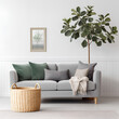 Living room interior with gray velvet sofa, pillows, green plaid, lamp and fiddle leaf tree in wicker basket on white wall background, Generative AI