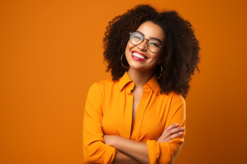 Wall Mural - Ultra beautiful woman girl smiling in a yellow, orange hat in solid yellow background