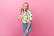 © deagreez - Photo of pretty adorable girl with wavy hairstyle dressed flower print blouse fingers touching neck isolated on pink color background