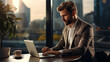 © Nataliia - Businessman using laptop computer in office. Happy middle aged man, entrepreneur, small business owner working online.
