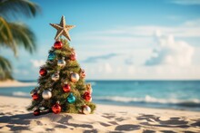 Christmas Tree Decorated On The Sandy Beach. Summer Xmas Vacations On A Tropical Island
