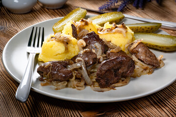 Canvas Print - Fried liver with onion.