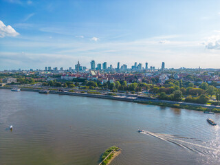 Wall Mural - Aerial panorama of Warsaw, Poland over the Vistual river and City center in a distance Old town. Downtown skyscrapers cityscape. Business