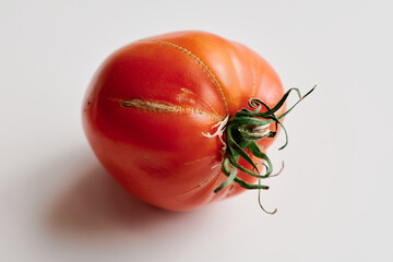 Red fresh tomatoes isolated on white background. Eco organic vegetables, seasonal harvest