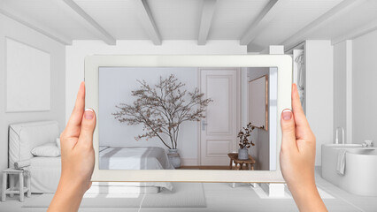 Wall Mural - augmented reality concept. hand holding tablet with ar application used to simulate furniture and de