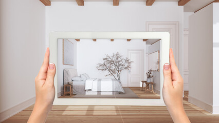 Wall Mural - augmented reality concept. hand holding tablet with ar application used to simulate furniture and de