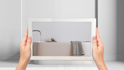 Wall Mural - augmented reality concept. hand holding tablet with ar application used to simulate furniture and de