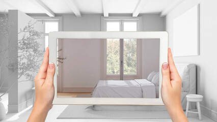 Wall Mural - augmented reality concept. hand holding tablet with ar application used to simulate furniture and de