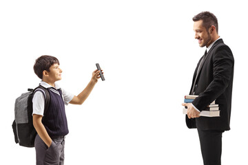 Canvas Print - Schoolboy showing a smartphone to a male teacher