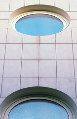 Poster - Modern architecture. Close up of some round windows in a financial building