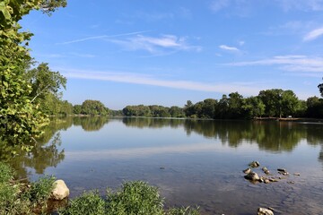 The river in the countryside on a sunny day.